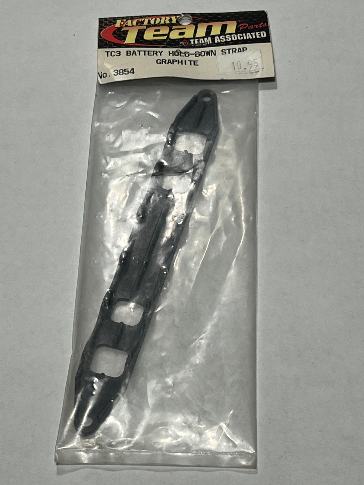 TC3 BATTERY HOLD-DOWN STRAP GRAPHITE-ASC3854